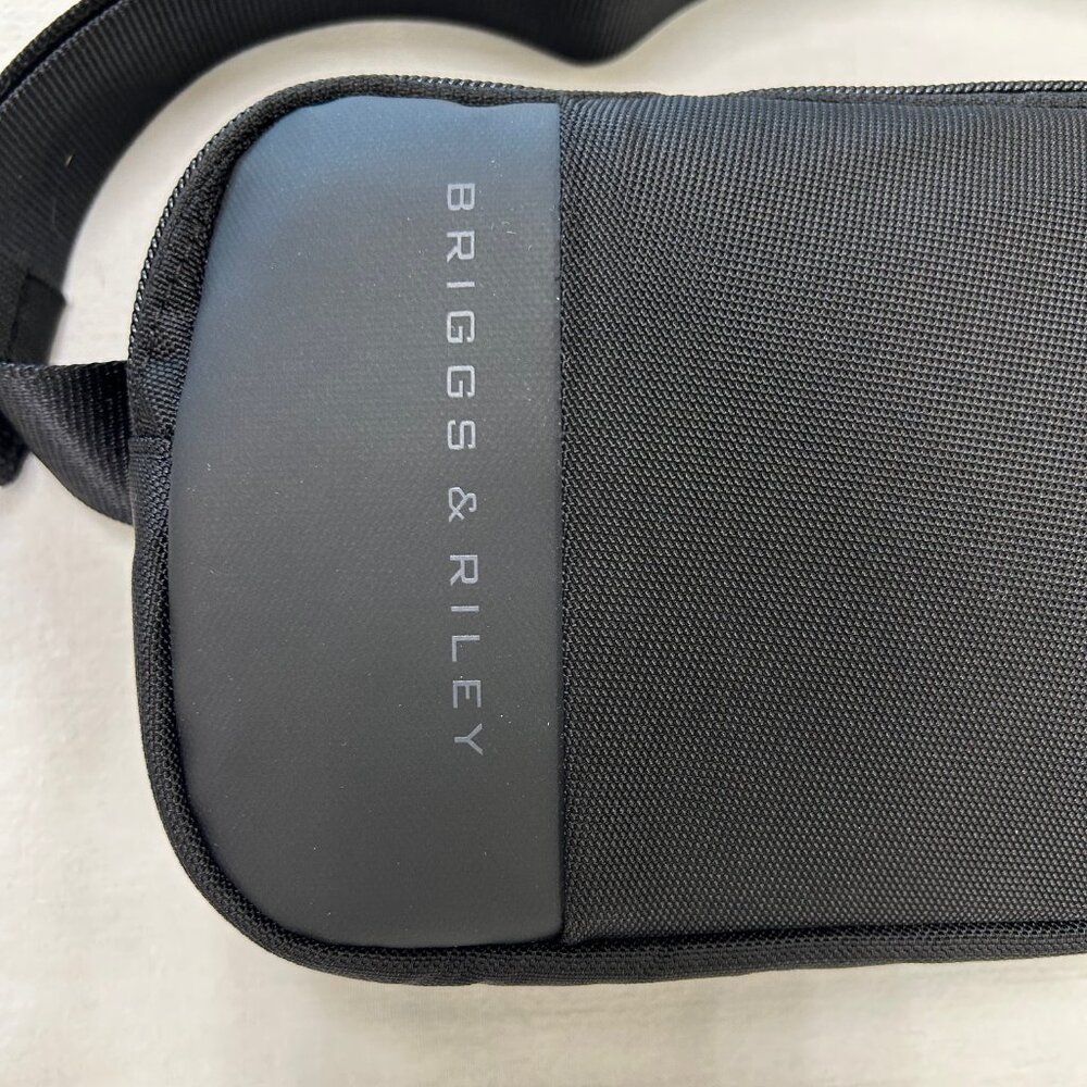 NWT Briggs & Riley sling bag — lightweight and minimalist.
